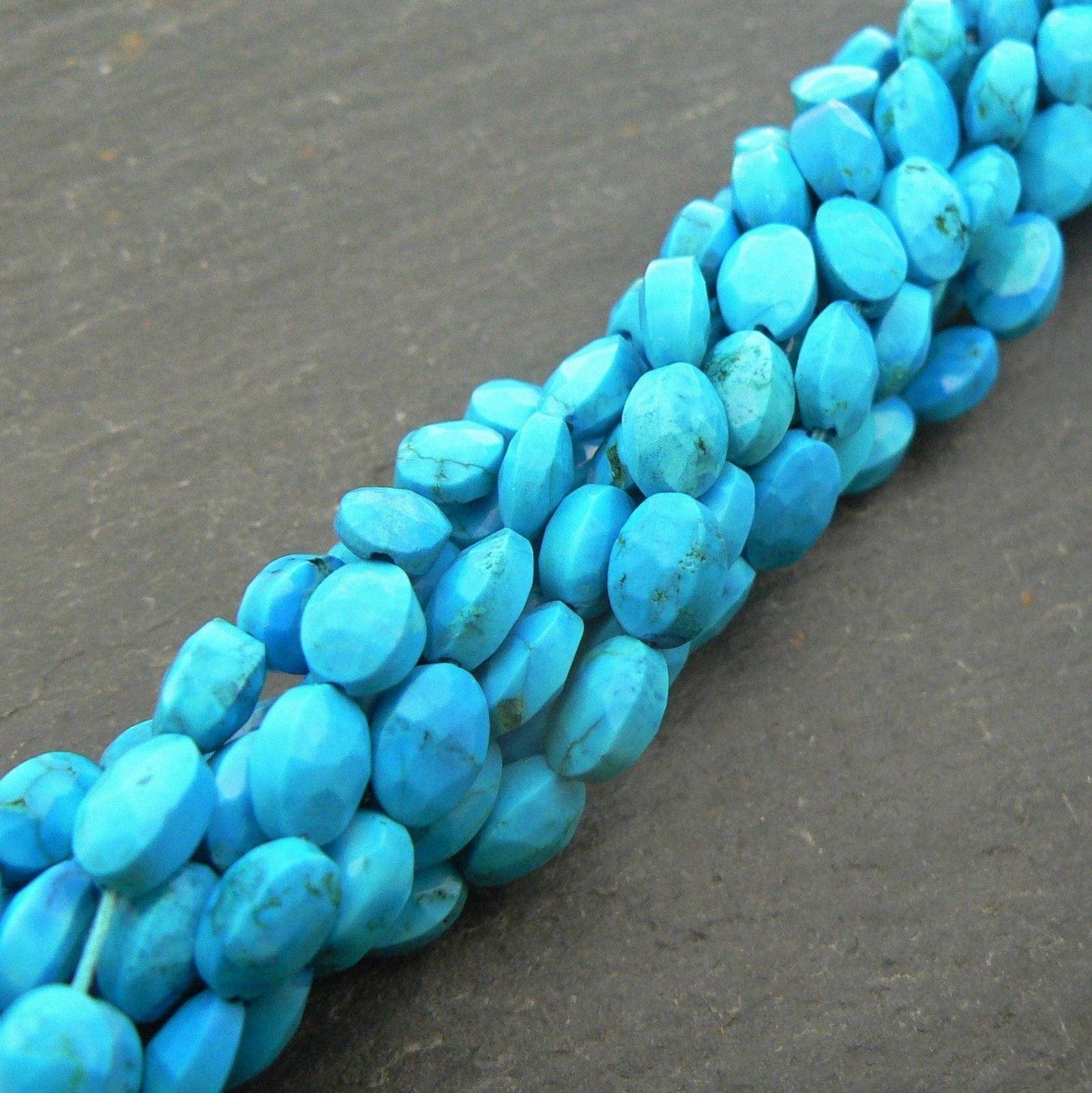precious sparkle Turquoise Faceted Oval Beads 15