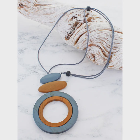 Suzie Blue Wooden Double Ring & Oval Pendant - Precious Sparkle