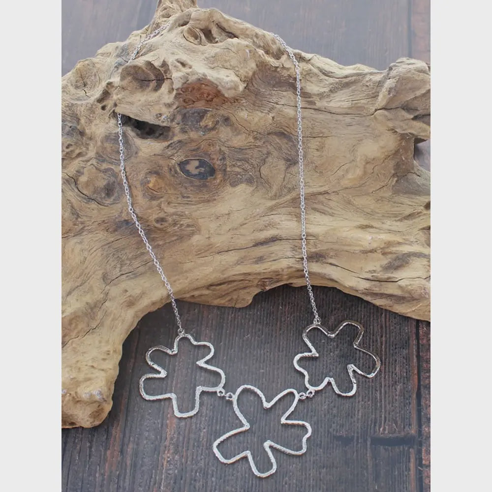 Suzie Blue Metal Abstract Flower Necklace - Precious Sparkle