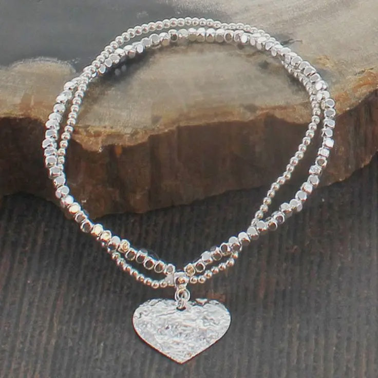 Suzie Blue Elasticated Two-Strand Hammered Heart Charm Bracelet - Precious Sparkle